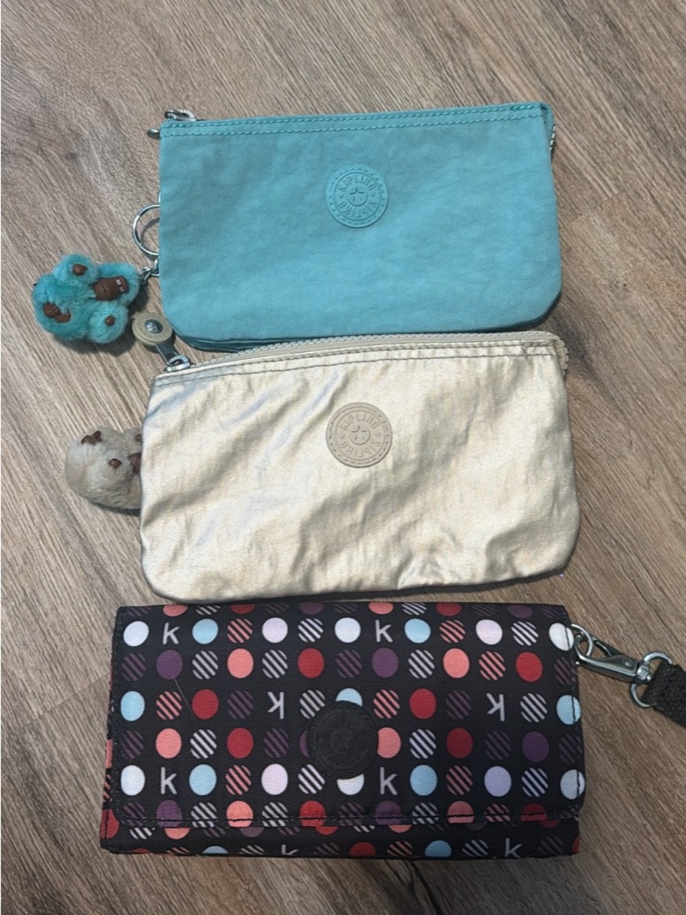 Kipling Teal, Gold and Multicolor Polka Dot Wallet Trio